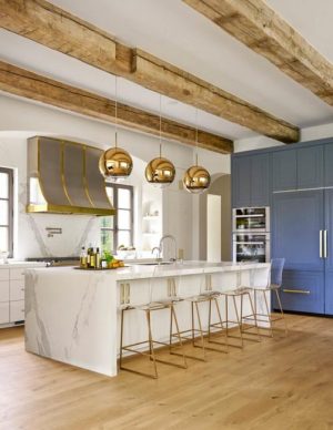 Warm Metal Accents Bringing Luxurious Glow into Modern Kitchen Design