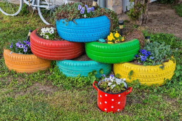 Recycling Used Tires for DIY Planters Making Vibrant Yard Decorations
