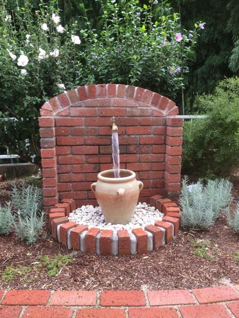 Garden Sinks and Wall Fountains Improving Outdoor Living Spaces